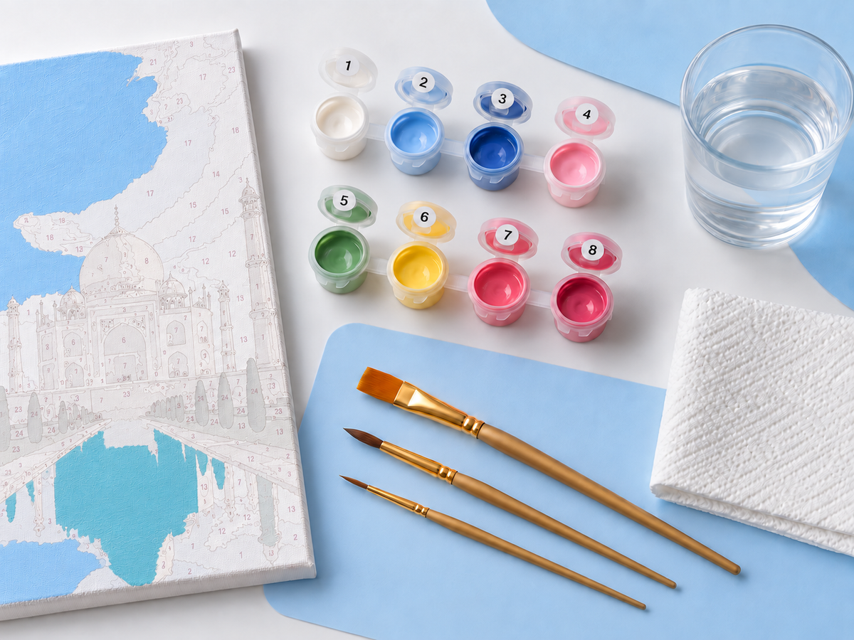 Canvas, numbered paints, water and brushes ready to begin