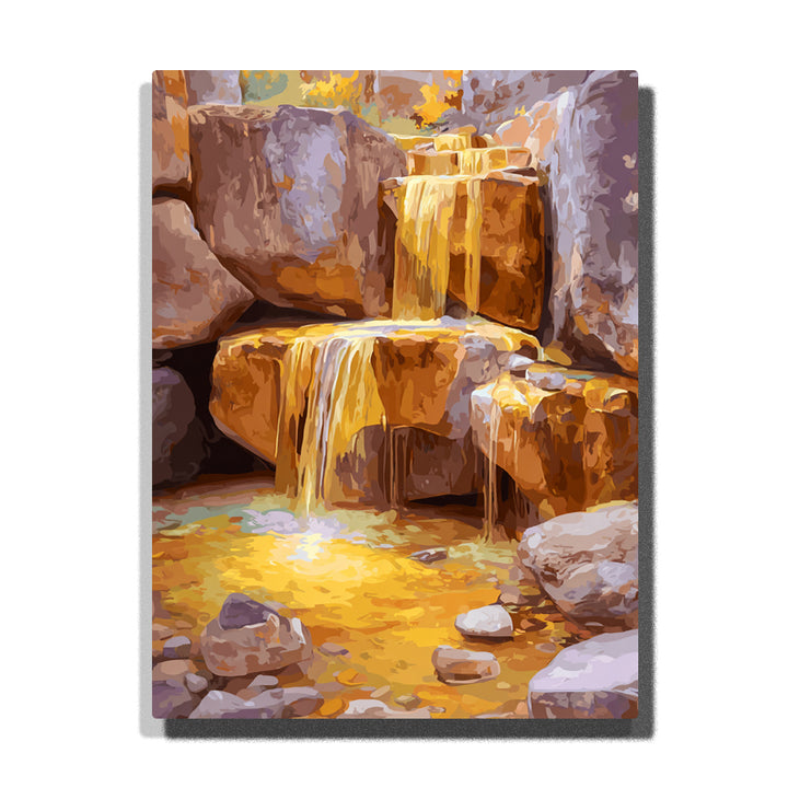 Golden honey waterfall flowing over caramel-brown rocky blocks, with amber water, cream highlights, lavender-gray stones, and a glowing yellow pool, Paint by Numbers kit for kids by PaintEasy.