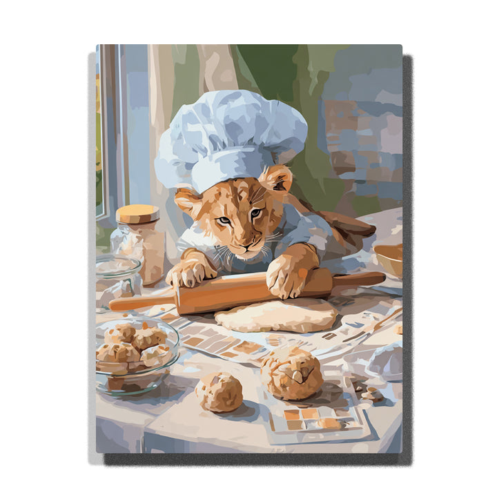 Lion cub in a white chef hat rolling dough on a kitchen table with apron, rolling pin, cookie pieces, glass jars, and warm baking scene, paint by numbers wall art by PaintEasy