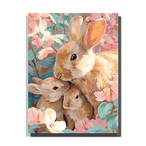paint by numbers artwork depicting rabbit mother and two baby rabbits surrounded by pastel flowers and soft leaves, animal wall decor for adults by PaintEasy