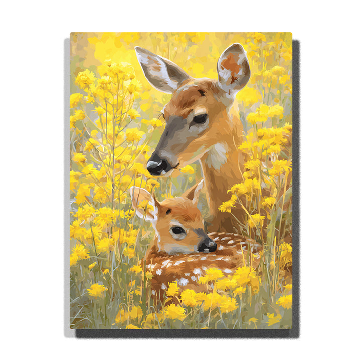 paint by numbers artwork depicting deer mother and fawn in yellow wildflower field with warm sunlight, animal wall decor for adults by PaintEasy