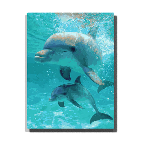 paint by numbers artwork depicting dolphin mother and baby swimming underwater with blue water, light rays and bubbles, ocean animal wall decor for adults by PaintEasy