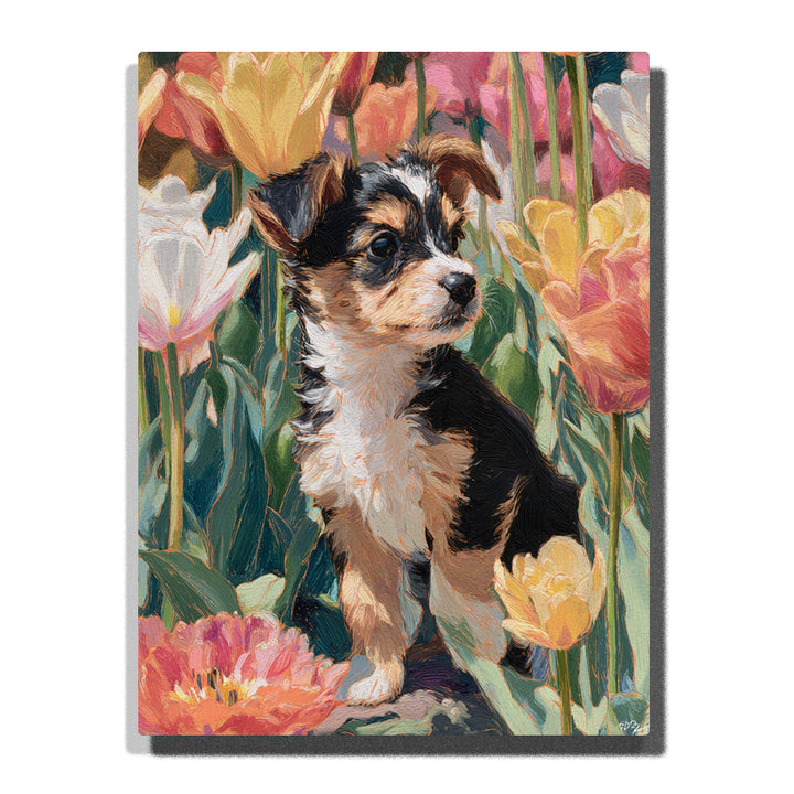 Small black puppy sitting among pastel tulips with white chest, tan markings, pointed ears, green stems, and bright spring flowers, paint by numbers wall art by PaintEasy
