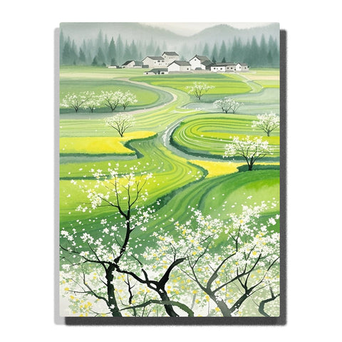Paint by numbers kit featuring spring countryside with blossoming trees, winding green fields, and distant village