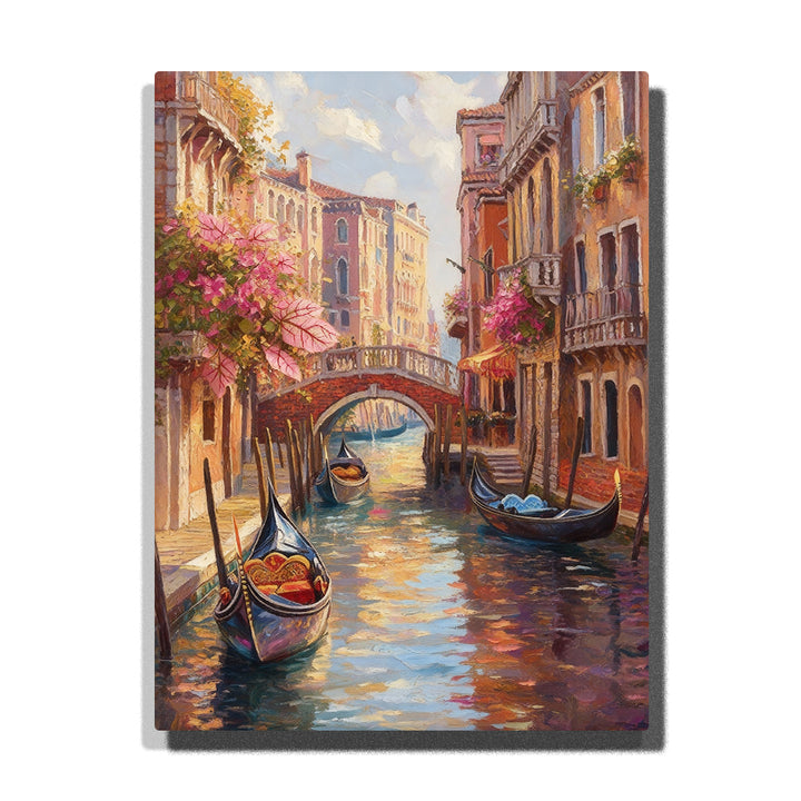 paint by numbers artwork depicting Venice canal with gondolas, flowered balconies and arched bridge under warm sunlight, romantic city wall decor for adults by PaintEasy