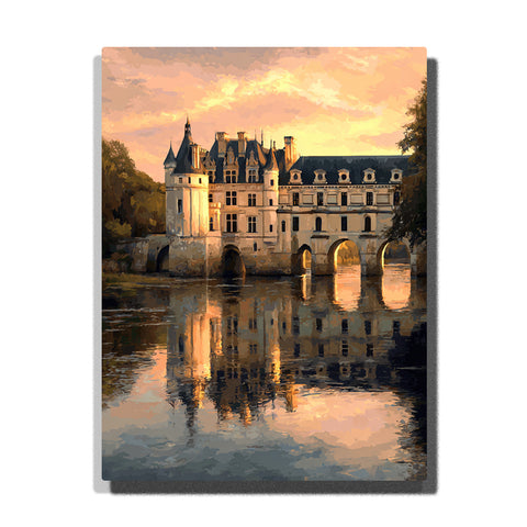 Château bridge reflections beneath a soft gold evening sky with arched stone structure, calm river mirror, and elegant historic city architecture, city paint by numbers wall art by PaintEasy