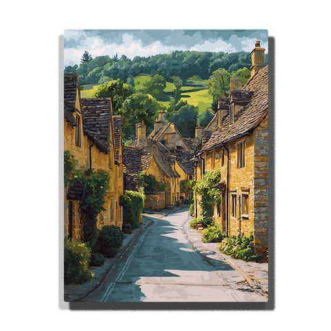 Sunlit stone village lane beneath green hills with honey-colored cottages, winding road, and leafy residential charm, city paint by numbers wall art by PaintEasy