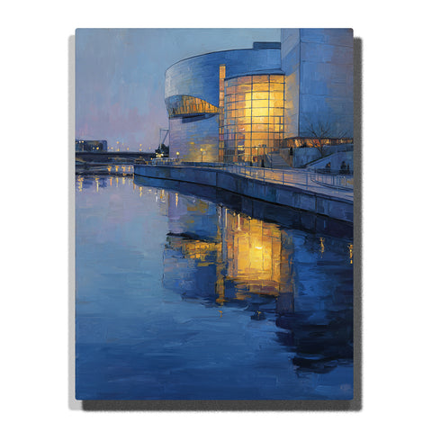 Modern riverside building with glowing glass windows and golden reflections across calm blue water, city paint by numbers wall art by PaintEasy