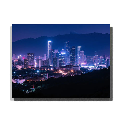 paint by numbers artwork depicting purple night skyline with glowing city lights and dark mountain silhouette, modern city wall decor for adults by PaintEasy