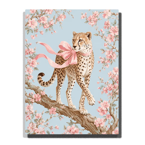 Animal Paint by Numbers For Adults featuring elegant spotted cheetah with flowing pink ribbon walking on tree branch surrounded by pink cherry blossoms and blue sky