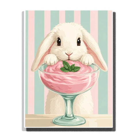 Bunny Paint by Numbers For Adults featuring fluffy white rabbit with floppy ears peeking over a glass cup of creamy pink dessert topped with green mint leaves
