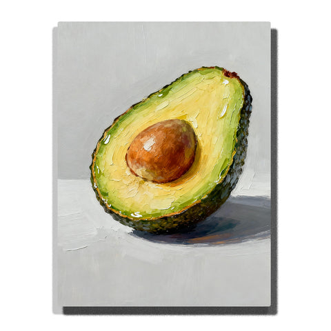 Sliced avocado half with a brown pit on a white tabletop, featuring yellow-green flesh, dark textured skin, glossy highlights, and soft gray-blue shadow.