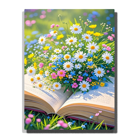 White daisies and colorful wildflowers resting on an open book, surrounded by green grass and soft garden light in this Paint by Numbers artwork.