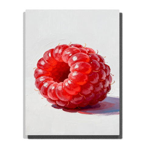 Close-up red raspberry on a white tabletop, featuring glossy rounded drupelets, deep center shadow, soft highlights, tiny hairs, and a cast shadow.
