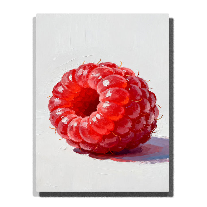 Close-up red raspberry on a white tabletop, featuring glossy rounded drupelets, deep center shadow, soft highlights, tiny hairs, and a cast shadow.