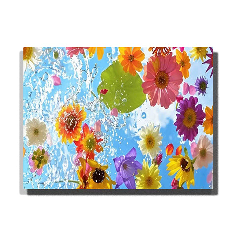 Colorful summer flowers floating on sparkling bright blue water with a green lily pad and shimmering reflections in this Paint by Numbers artwork.
