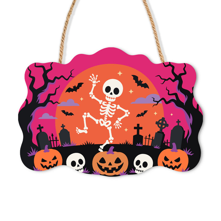 Skeleton dancing above pumpkins and gravestones against a pink Halloween sky