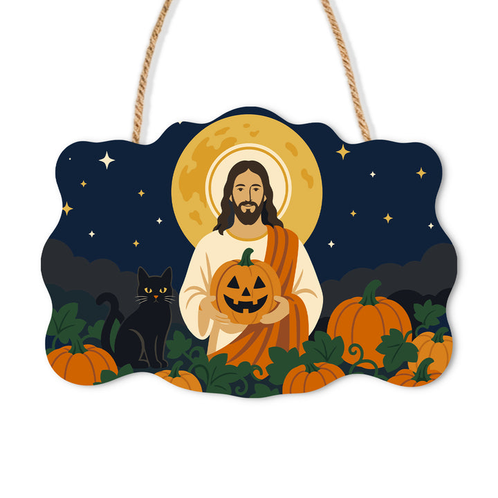 Jesus and a black cat in a moonlit pumpkin patch on a wooden sign