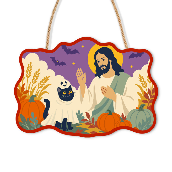 Jesus beside a black cat in a ghost costume among pumpkins and autumn plants