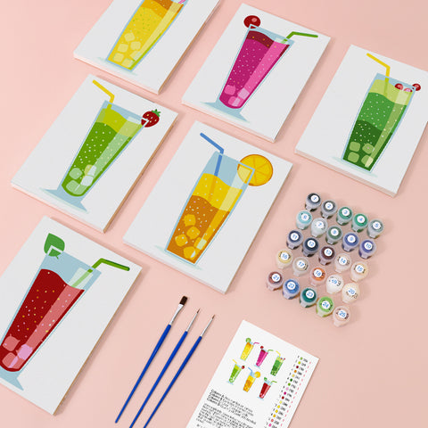 Six mini paint by numbers canvases arranged in a set, each featuring a colorful citrus juice illustration including lemon juice, lime cooler, orange soda, strawberry juice, green apple drink, and mixed fruit juice, all designed in a clean flat illustration style with bright translucent colors and fruit garnishes such as citrus slices and berries.