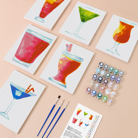 Six mini paint by numbers canvases arranged in a set, each featuring a different vibrant cocktail glass illustration including red berry cocktail, green martini, yellow citrus spritz, orange tropical drink, pink fruit beverage, and blue mixed cocktail. Each artwork uses a clean illustration style with bold color blocking, smooth gradients, and simplified glass silhouettes for a modern decorative look.