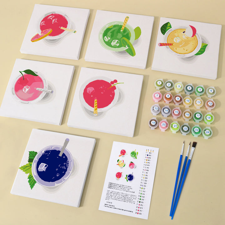 Six mini paint by numbers canvases shown in a top-down view, each featuring a different fruit juice drink including strawberry juice, citrus juice, lime juice, berry juice, mixed fruit juice, and blue fruit juice. Each design uses flat illustration style with bold colors, circular glass shapes, ice textures, fruit slices, and clean overhead composition.
